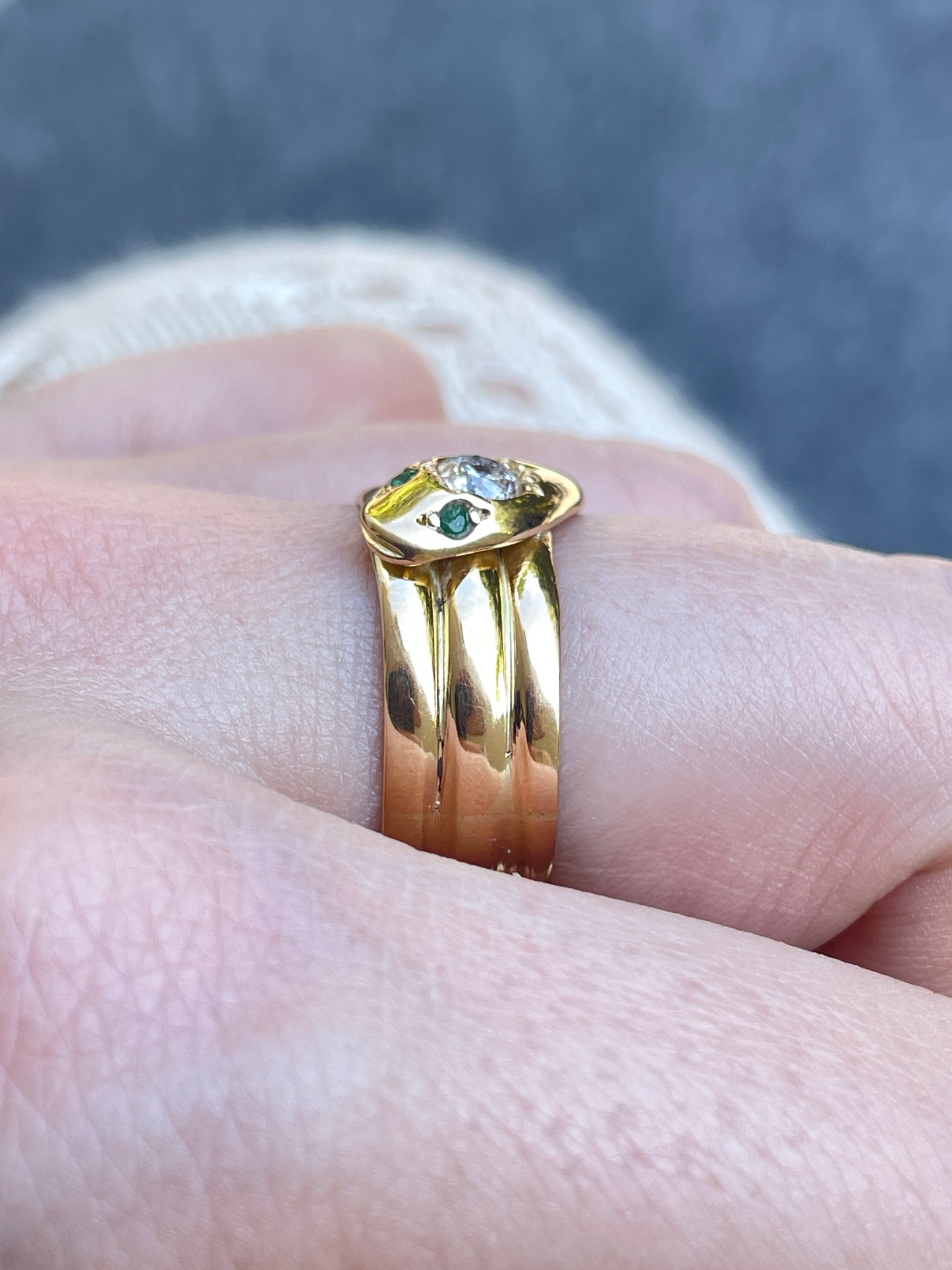 Vintage yellow 18K snake ring with approx .45 ctw diamond and emerald eyes, size 7.5