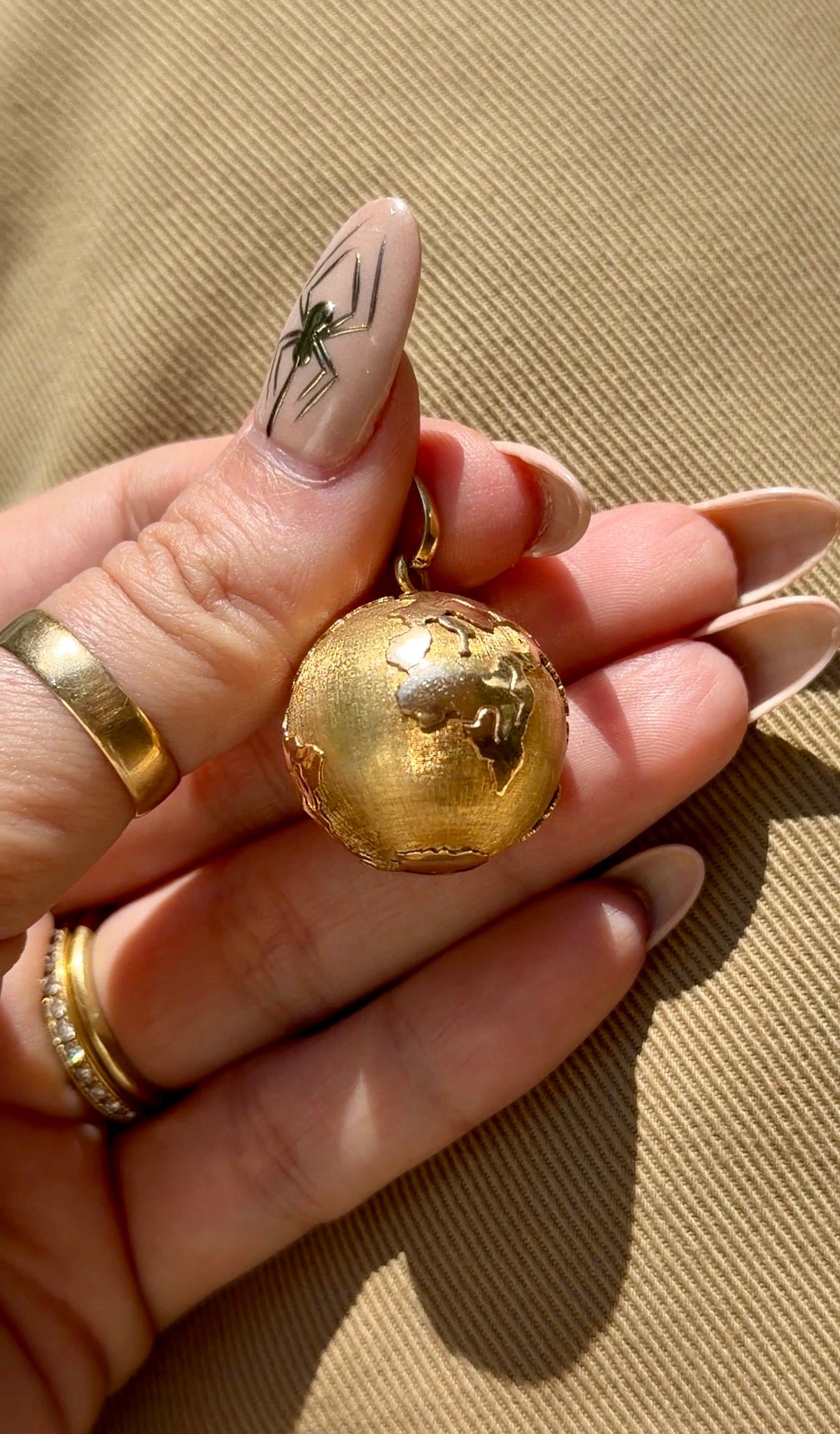Vintage yellow 14K gold 3D globe pendant