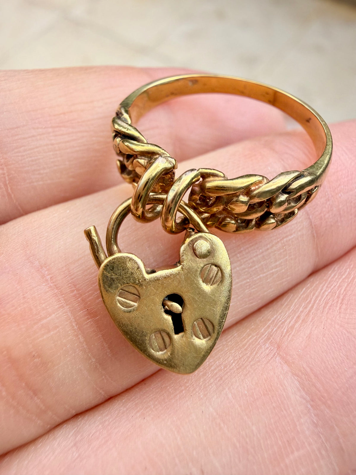 Antique yellow 14K knot ring with operating padlock, size 6.75
