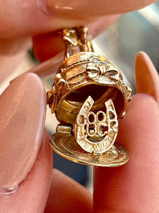 Vintage 9K gold articulated Wedding cake pendant with horseshoe surprise