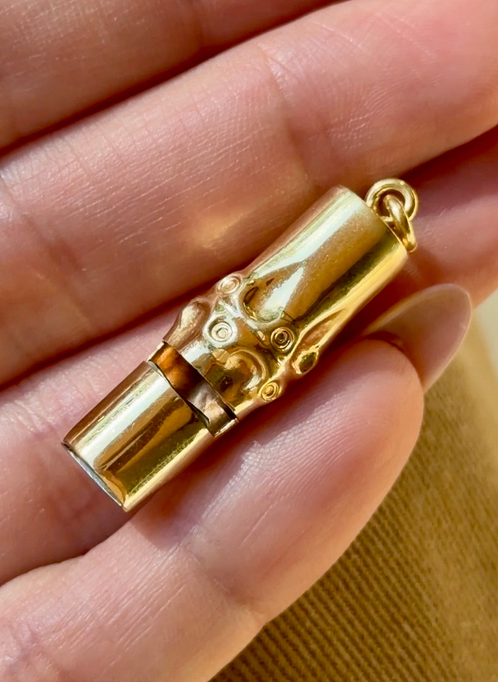 Vintage yellow 18K bamboo motif whistle pendant