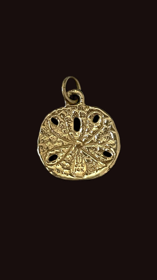 Vintage yellow 14K sanddollar charm