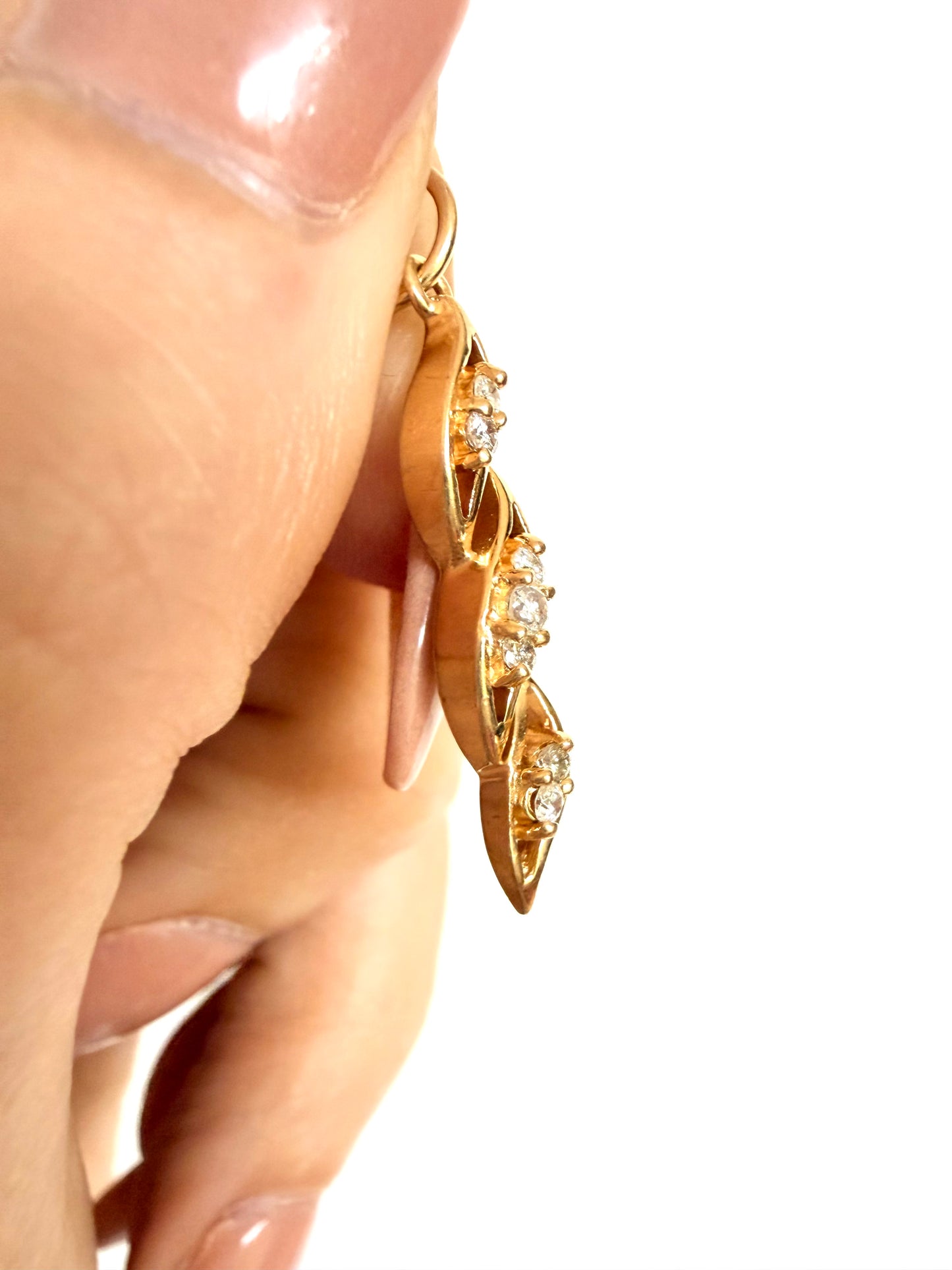 Vintage Yellow 14k approx .17ctw diamond swirl charm
