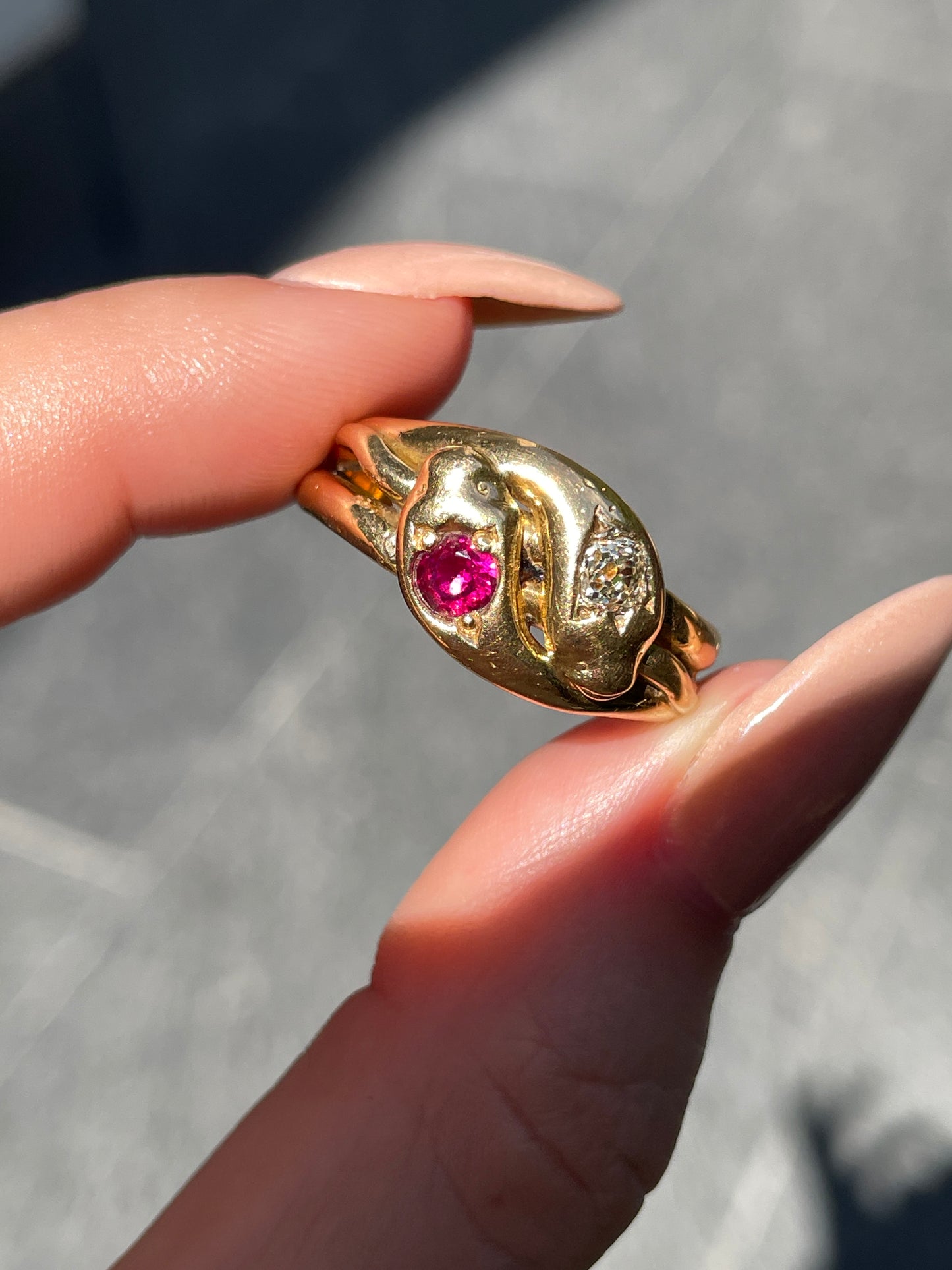 Antique Victorian yellow 18K pair of snakes ring with .25 ctw old mine cut diamond and .35 ctw ruby, size 11
