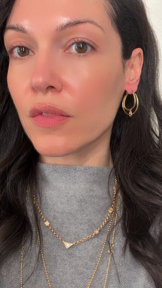 Vintage yellow 14K gold hoops with rope detail