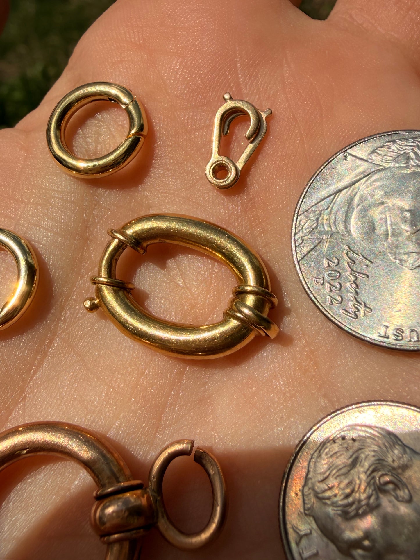 Various solid gold clasps and connectors