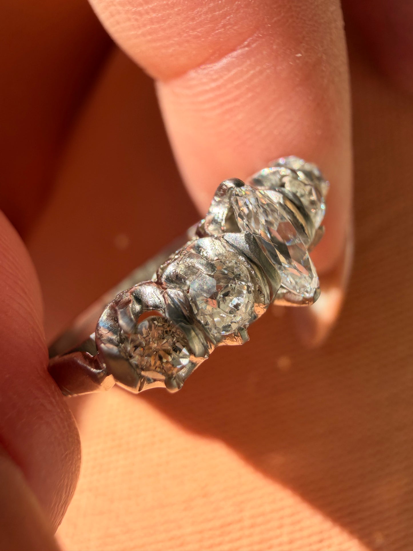 Antique platinum approx 1.1ctw moval diamond and old mine cut diamond 5 stone ring, size 5.5-5.75