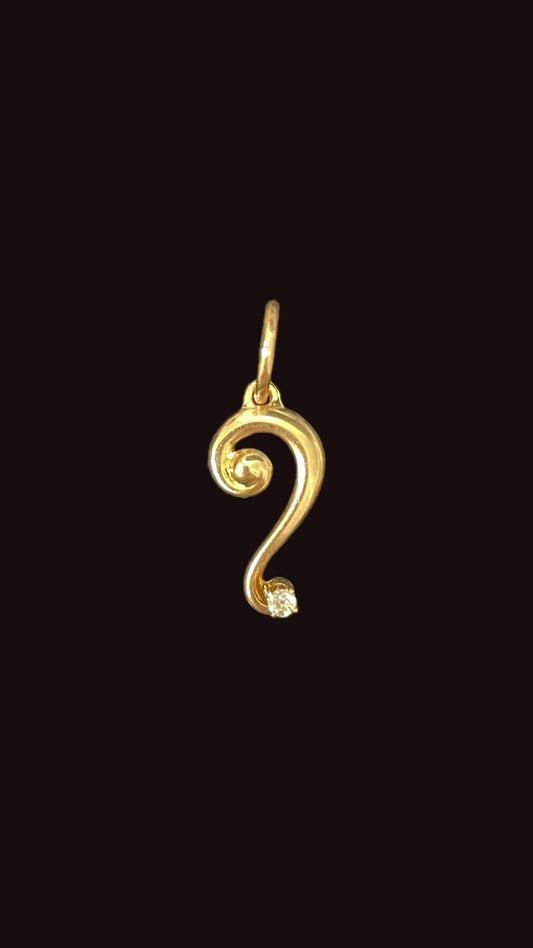 Antique yellow 14K question mark with .03 ctw old cut diamond charm