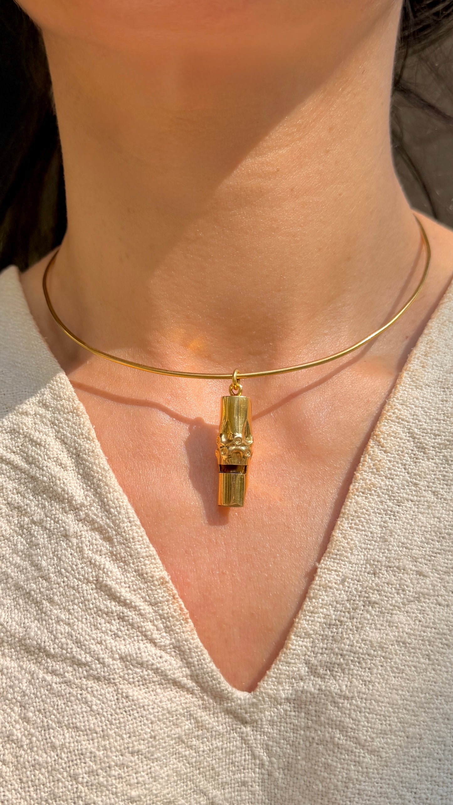 Vintage yellow 18K bamboo motif whistle pendant