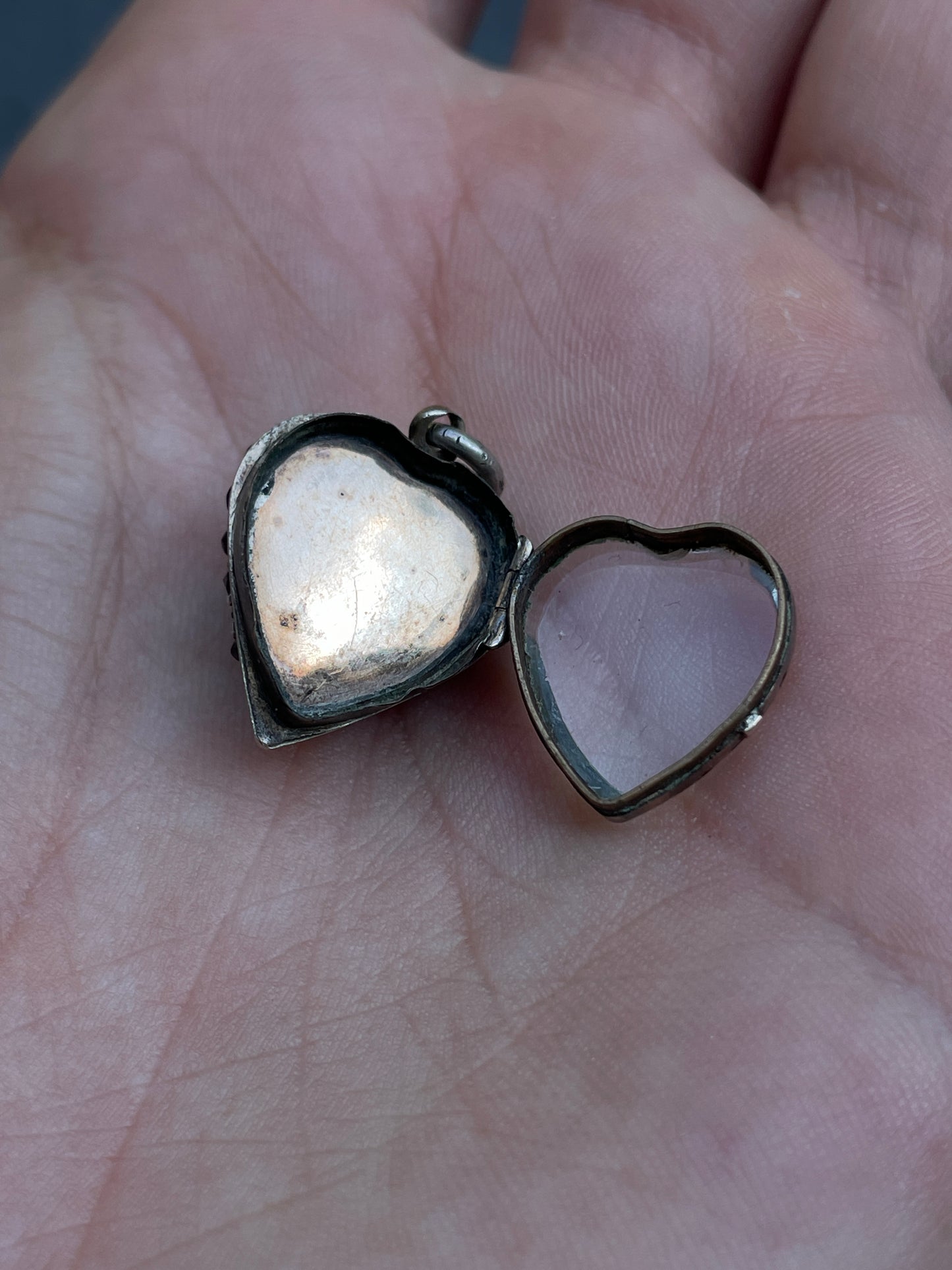 Antique sterling garnet heart celestial glass back locket charm