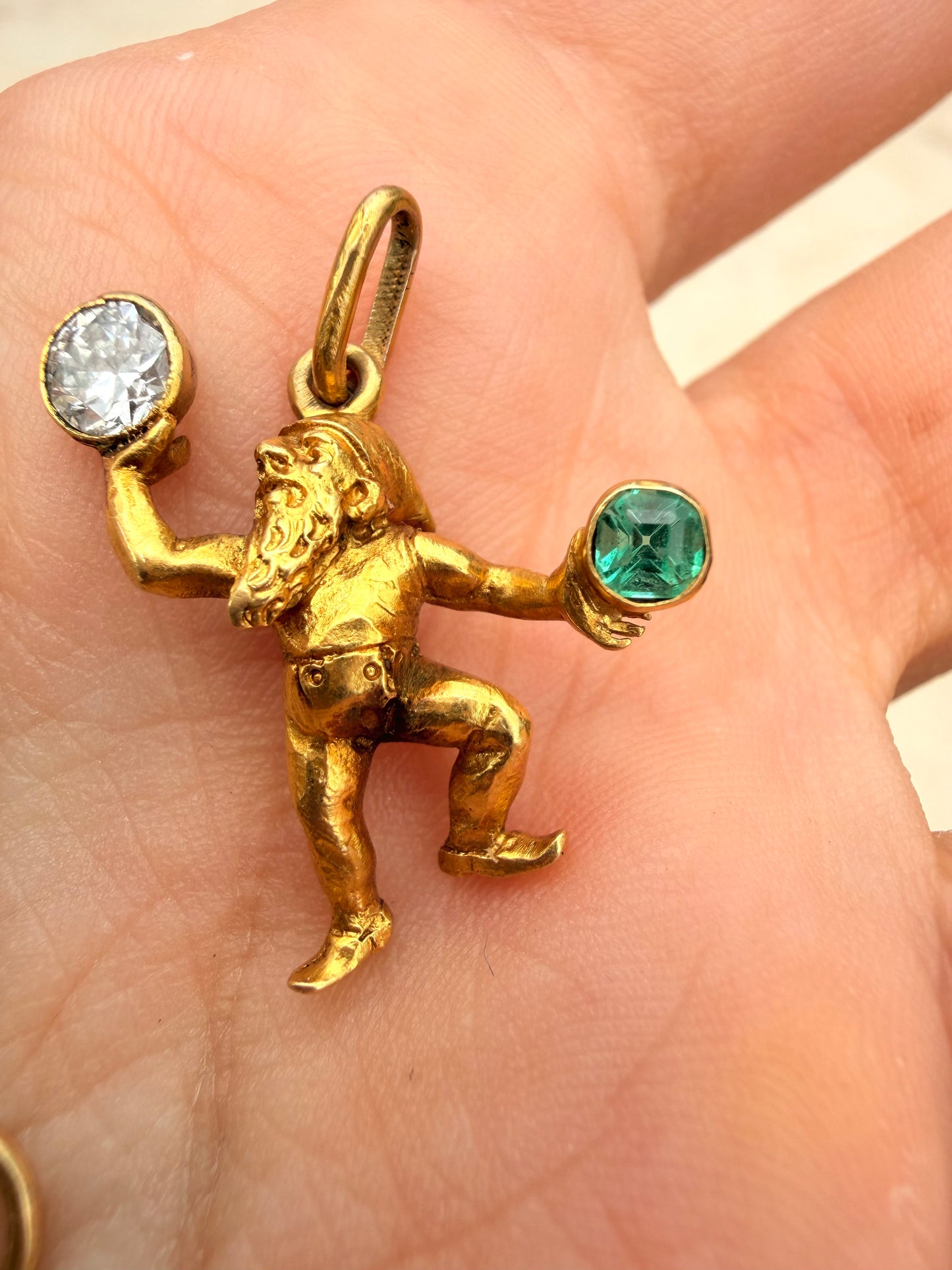 Antique yellow 19K gnome pendant with approx .27 ctw diamond and .15 ctw emerald
