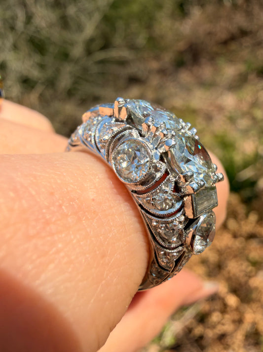 Vintage 1930/40s platinum domed ring with 3.7ctw old euro cut and old cut diamonds, size 7