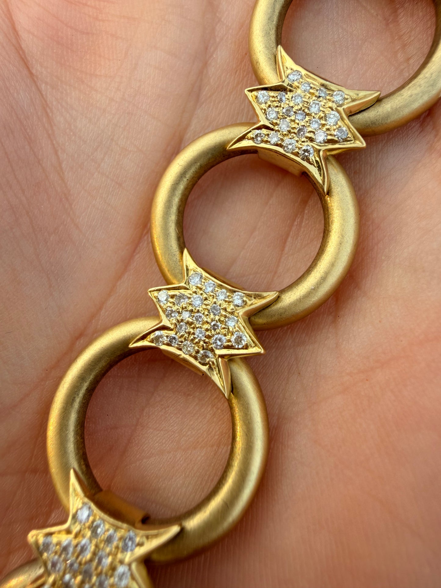 Vintage yellow 18K approx .85ctw champagne diamond starburst station open link bracelet, 7.25 inch