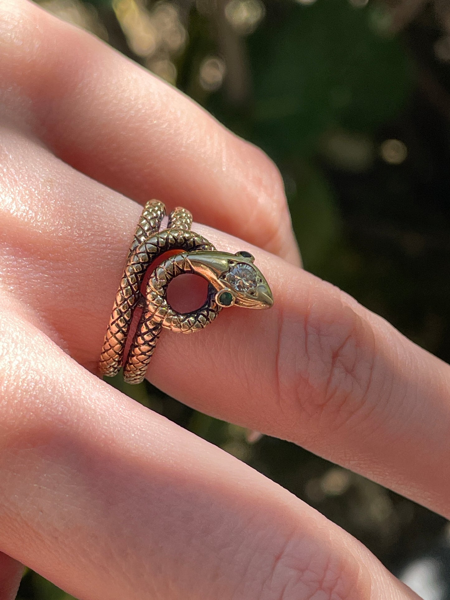Vintage yellow 14K textured snake ring with .1 ctw diamond and emerald eyes, size 6