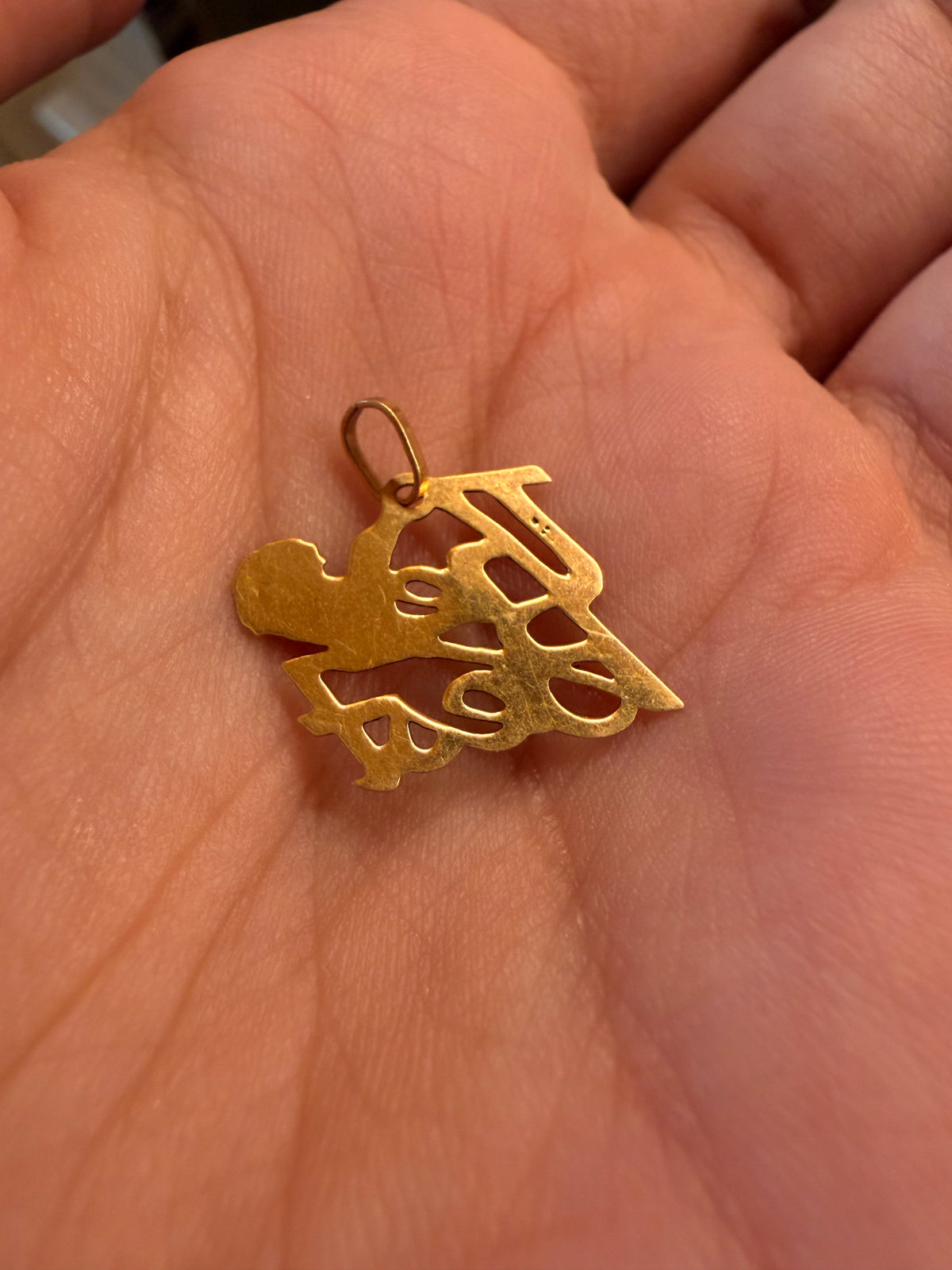 Vintage yellow 14K "the best" charm with rose detail