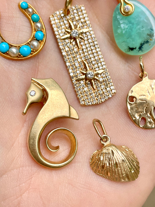 Vintage yellow 14K seahorse pendant with diamond