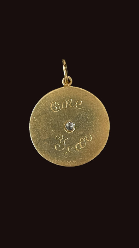 Vintage yellow 14K with .04 ctw diamond engine turned disc charm