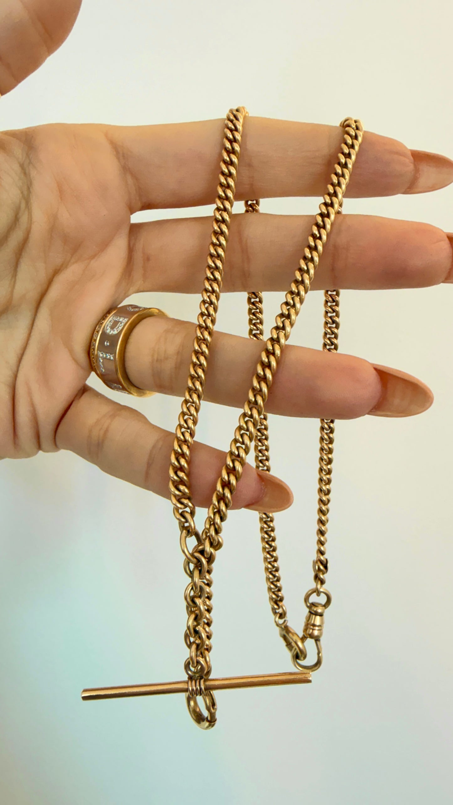 Antique yellow 14K round curb watch chain, 19 and 5/8 inch with 1.5 inch bolt dangle