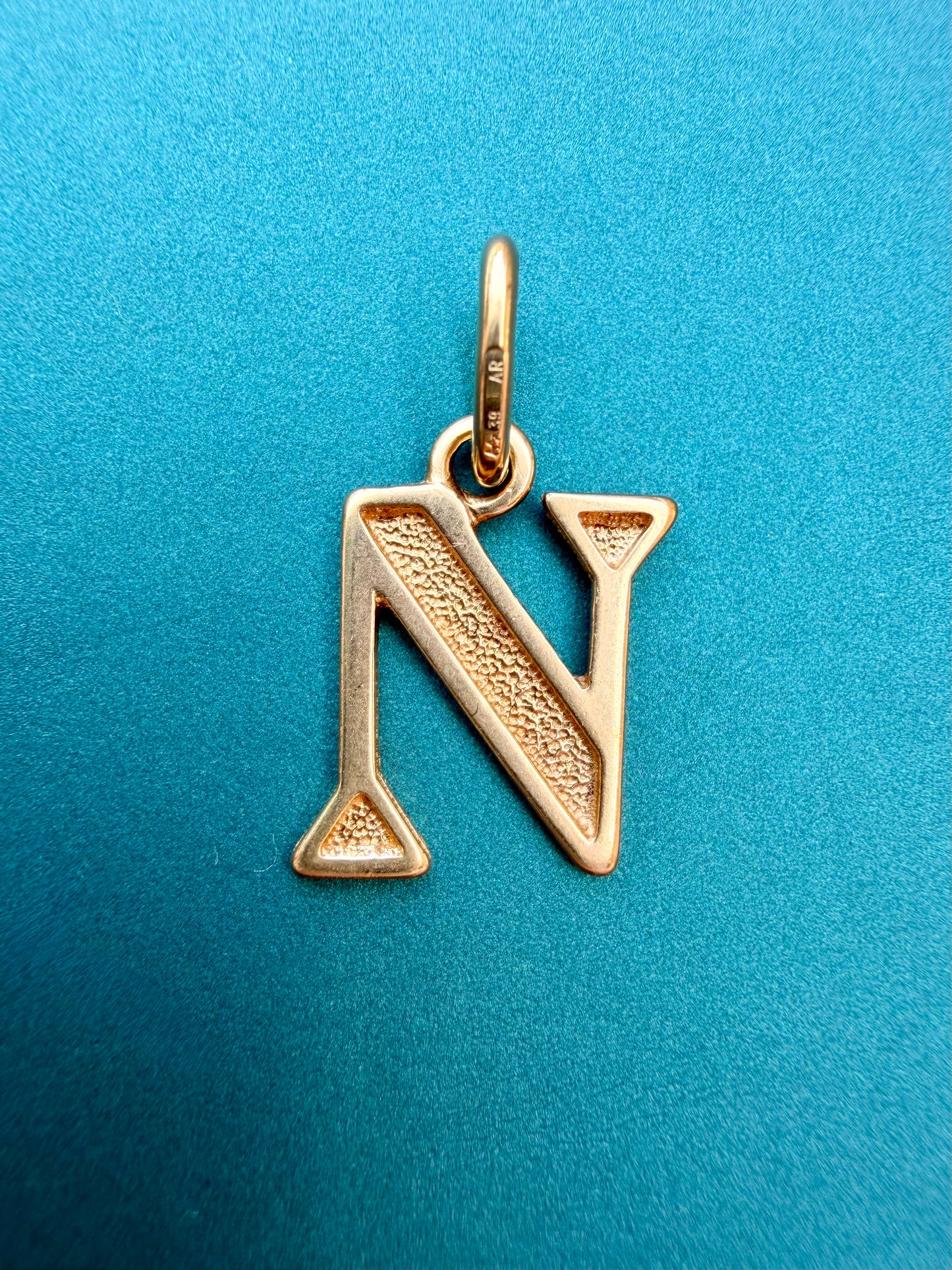 Vintage yellow 18K gold textured letter N charm