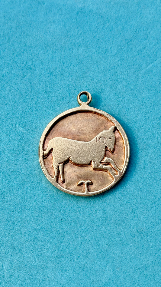 Vintage yellow 14K Aries zodiac pendant