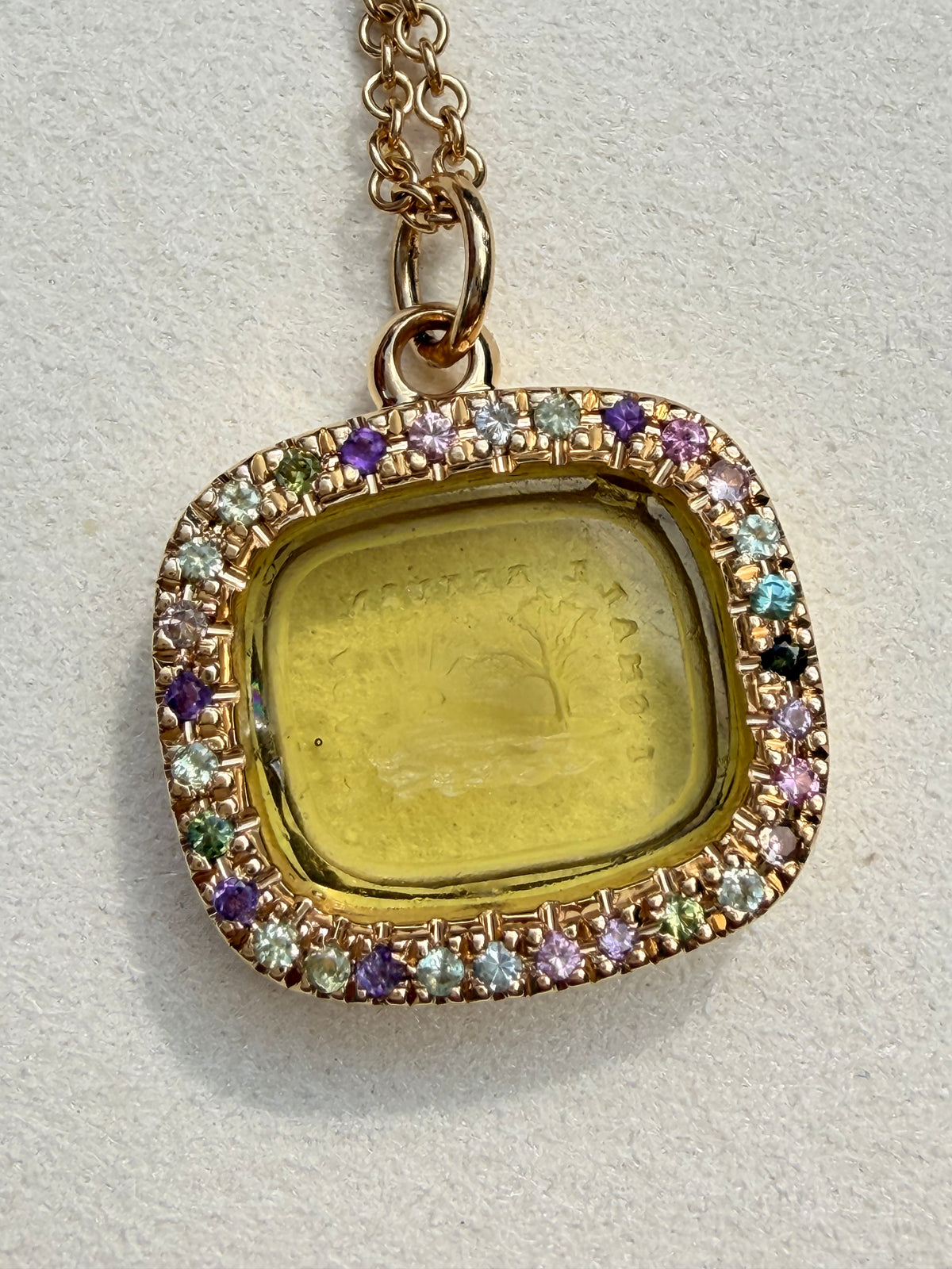 Antique 18K intaglio set in custom yellow 18K tourmaline border pendant by Bauble Magpie