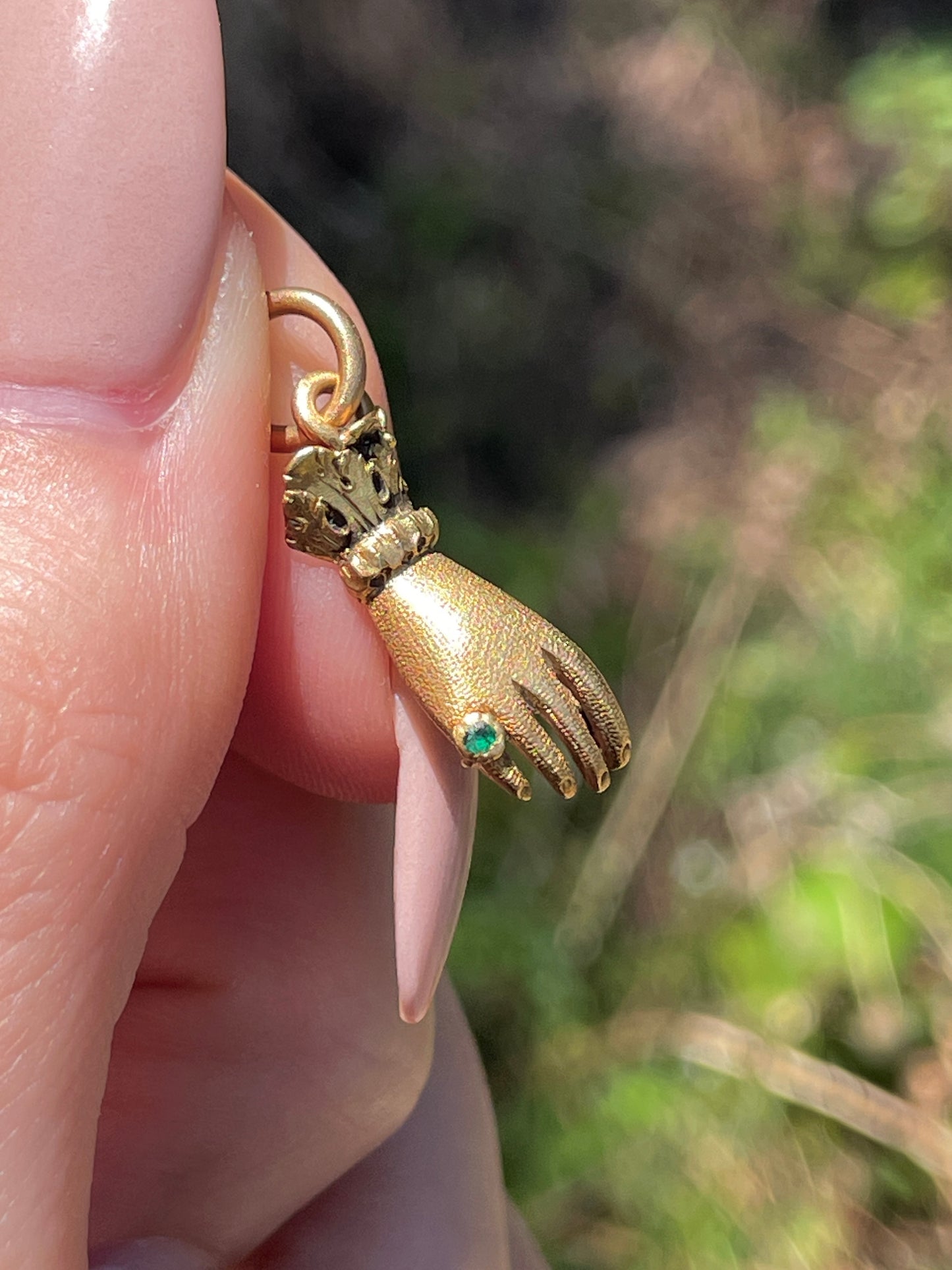 Antique yellow 18K hand charm wearing emerald ring