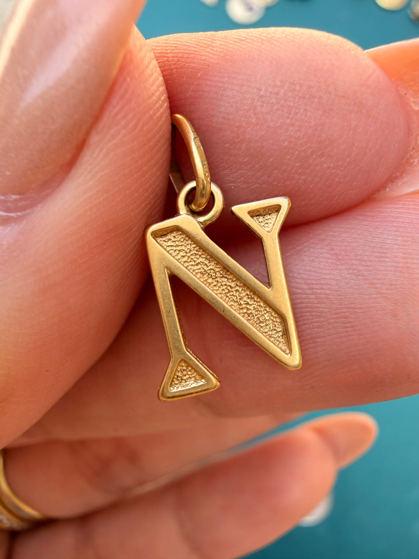 Vintage yellow 18K gold textured letter N charm