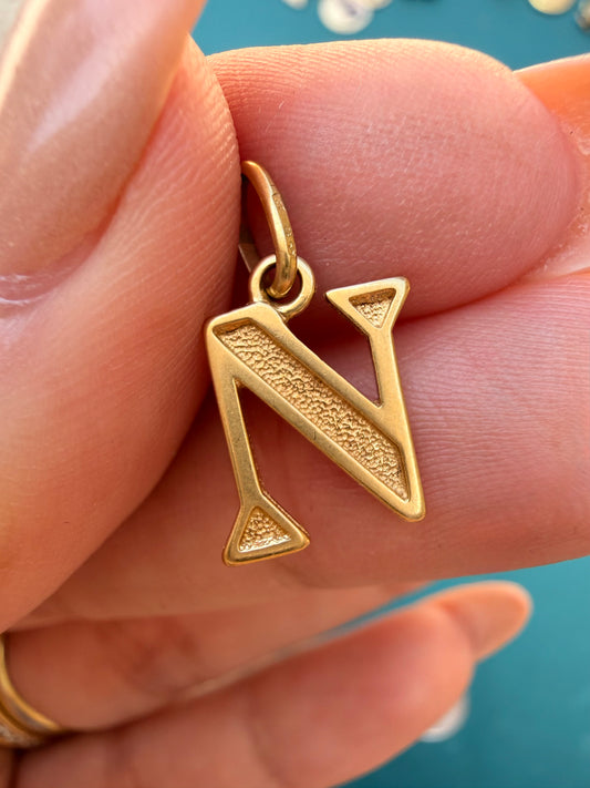Vintage yellow 18K gold textured letter N charm