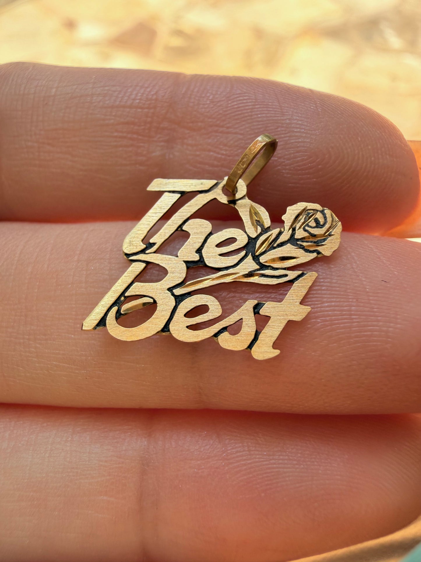 Vintage yellow 14K "the best" charm with rose detail