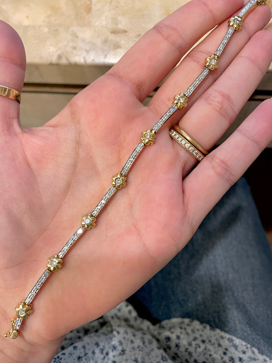 Vintage yellow 14K flower link approx 1.33 ctw diamond bracelet, 7 and 5/8 inch