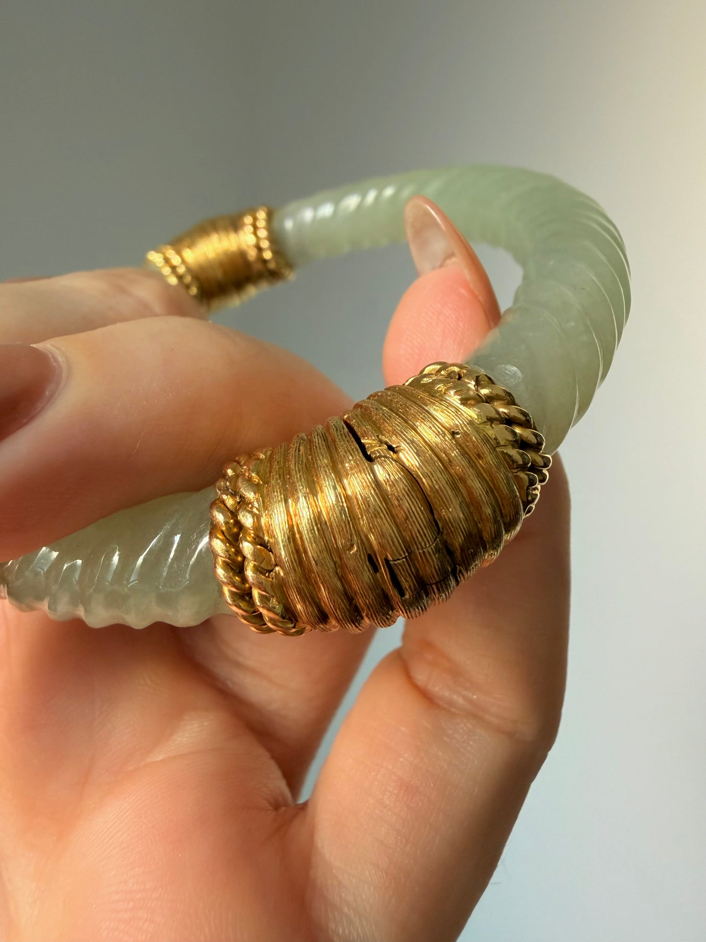 Vintage circa 1960s yellow 18K gold carved twist jade hinge bangle