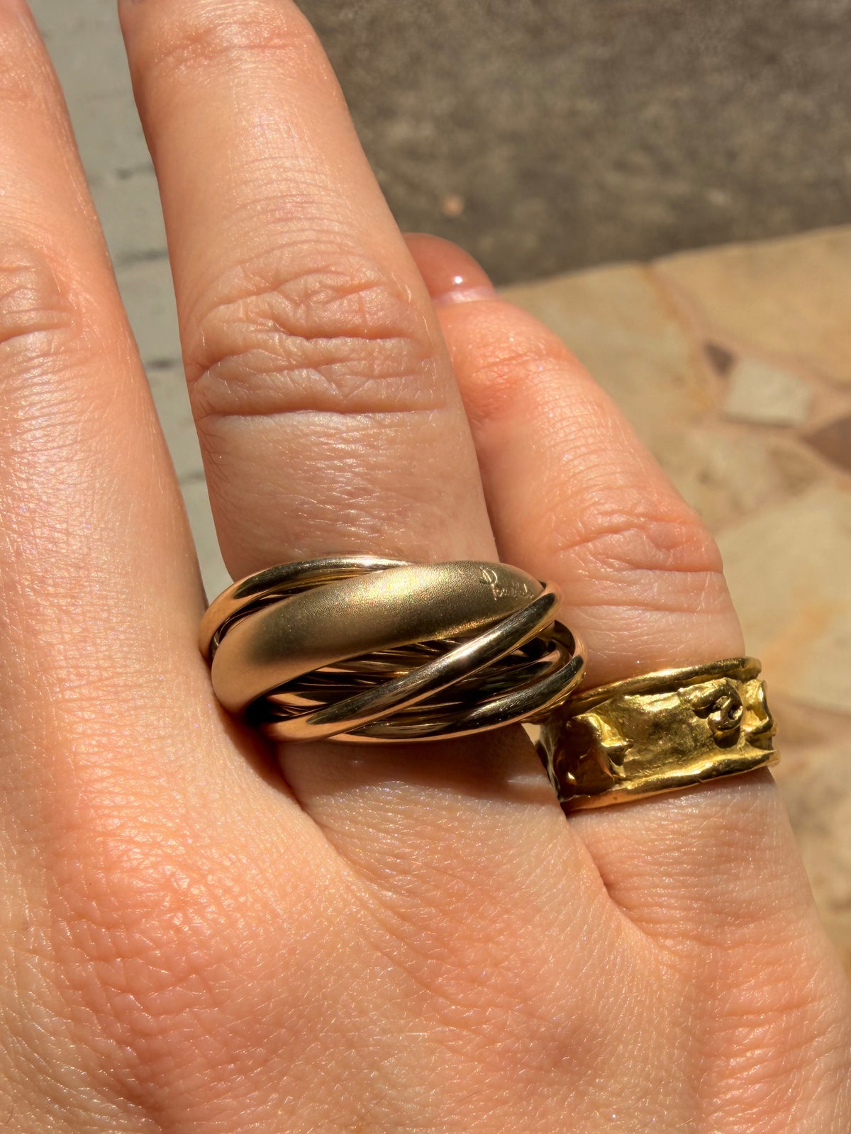 Vintage yellow 18K Pomellato designer eleven band rolling ring, size 6.25-6.5