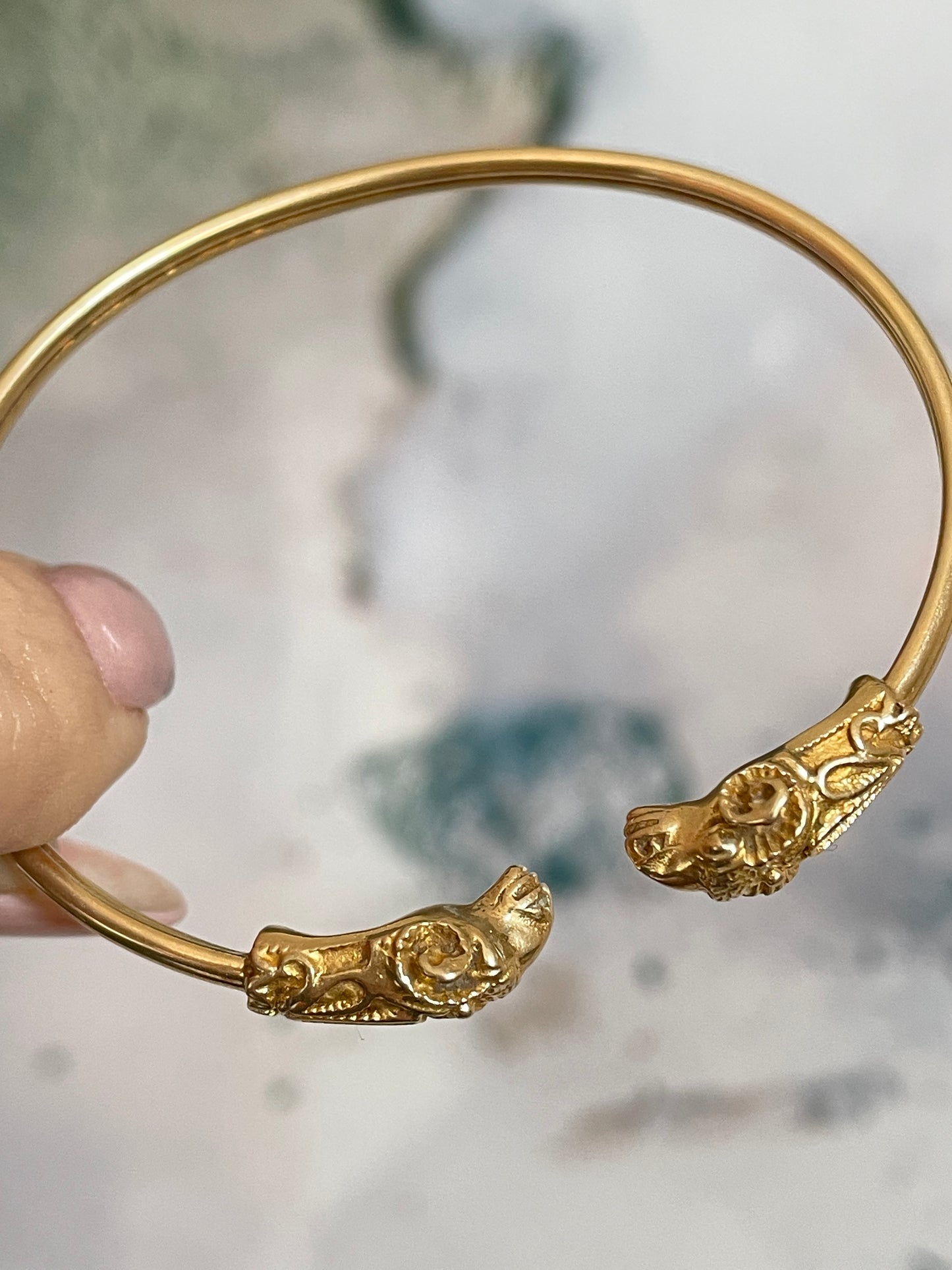 Vintage yellow 14K gold ram heads bangle