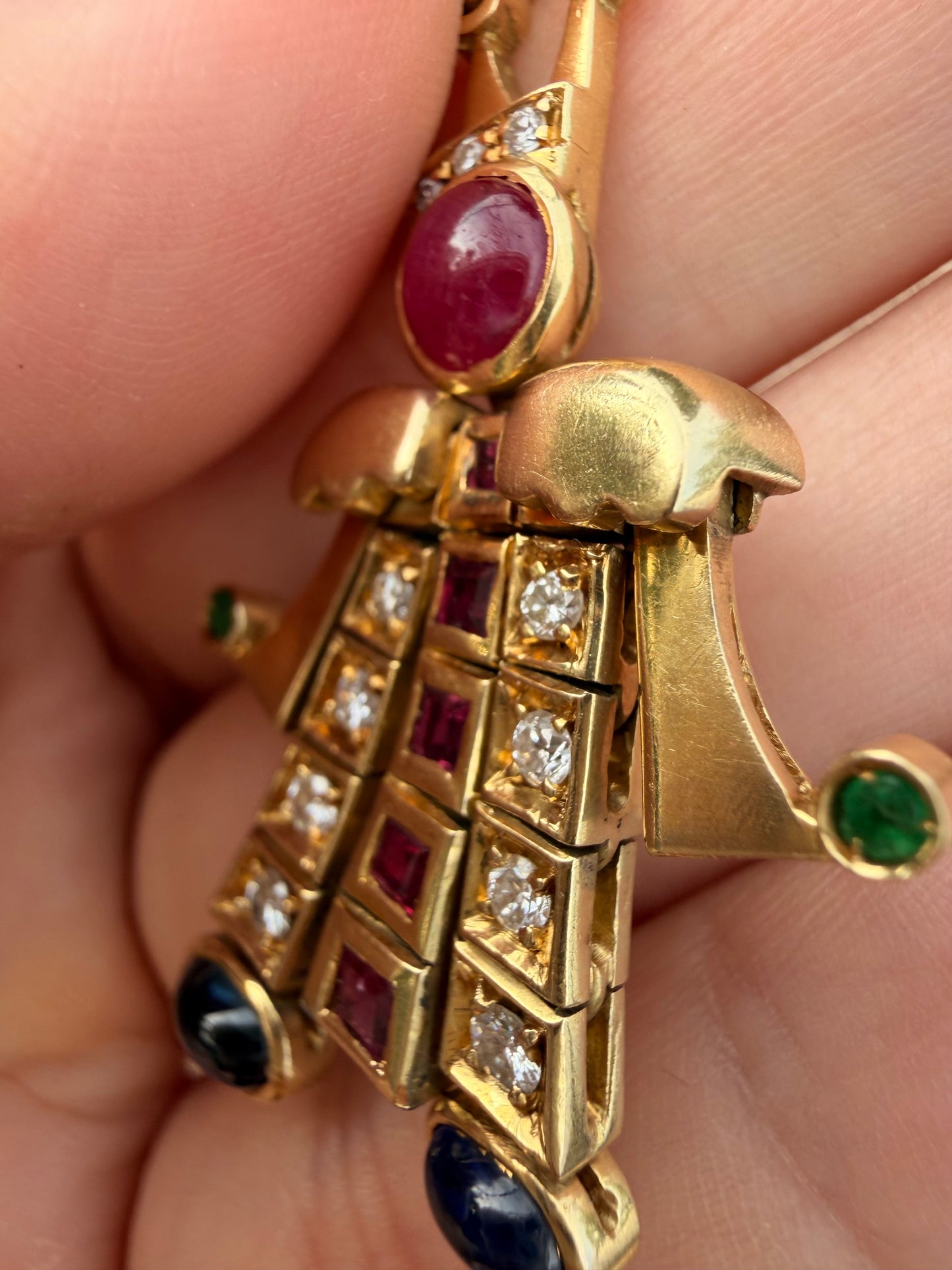 Vintage yellow 18K articulated jester pendant with over 3.1 ctw natural gemstones