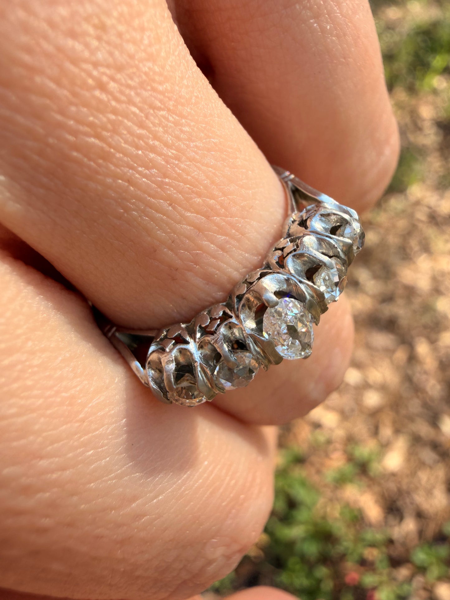 Antique platinum approx 1.1ctw moval diamond and old mine cut diamond 5 stone ring, size 5.5-5.75