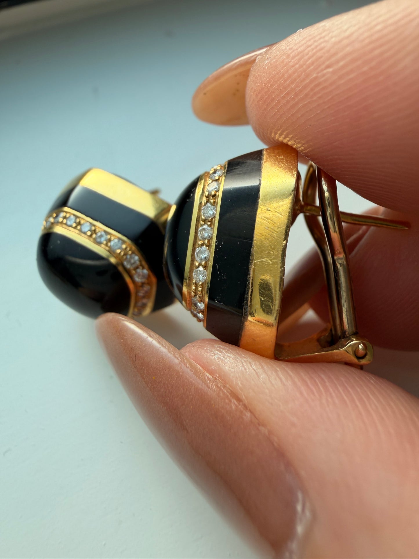 Vintage yellow 18K onyx and approx .33ctw diamond omega back earrings