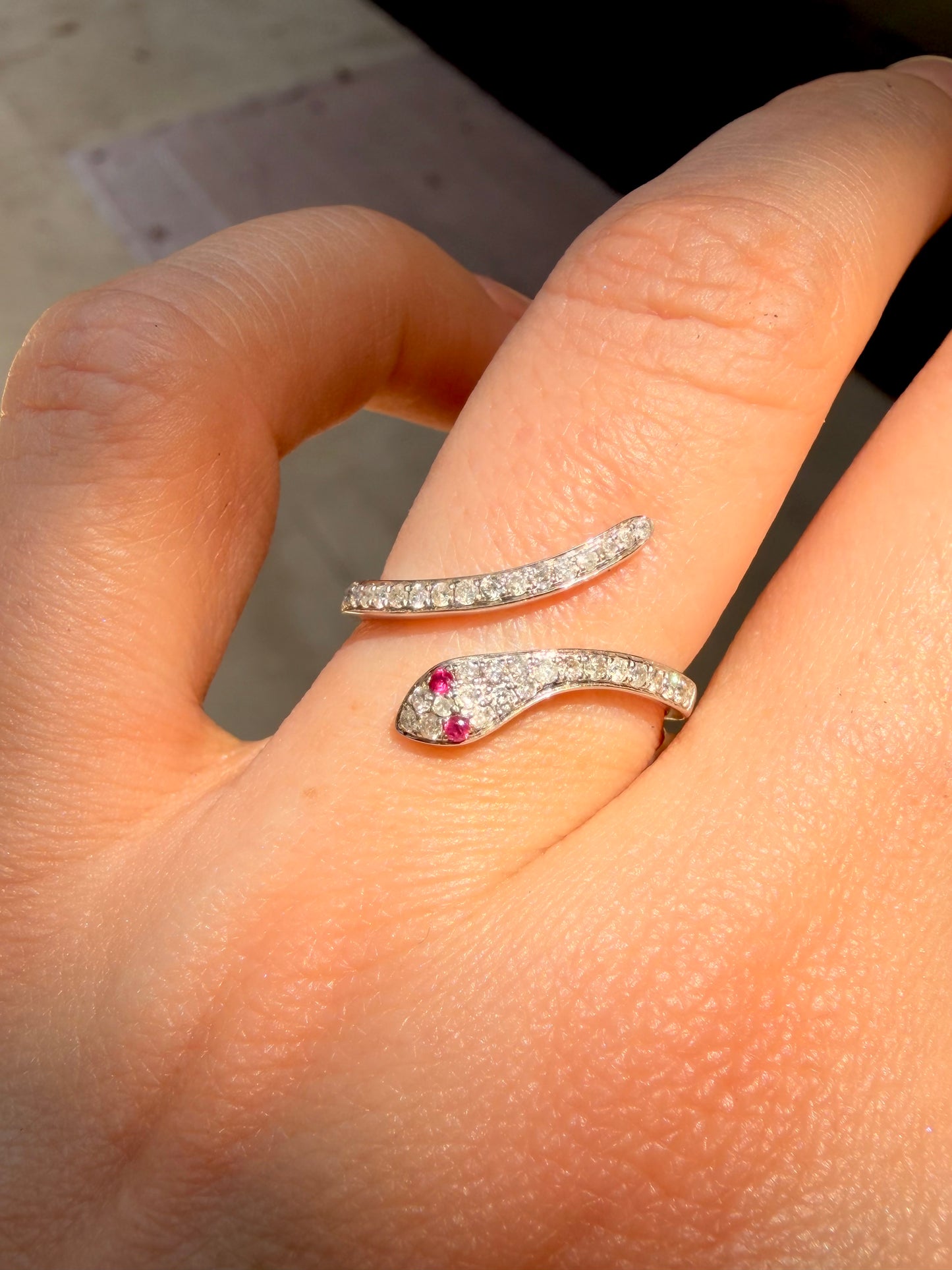 White 14K diamond and ruby snake ring, size 6.25