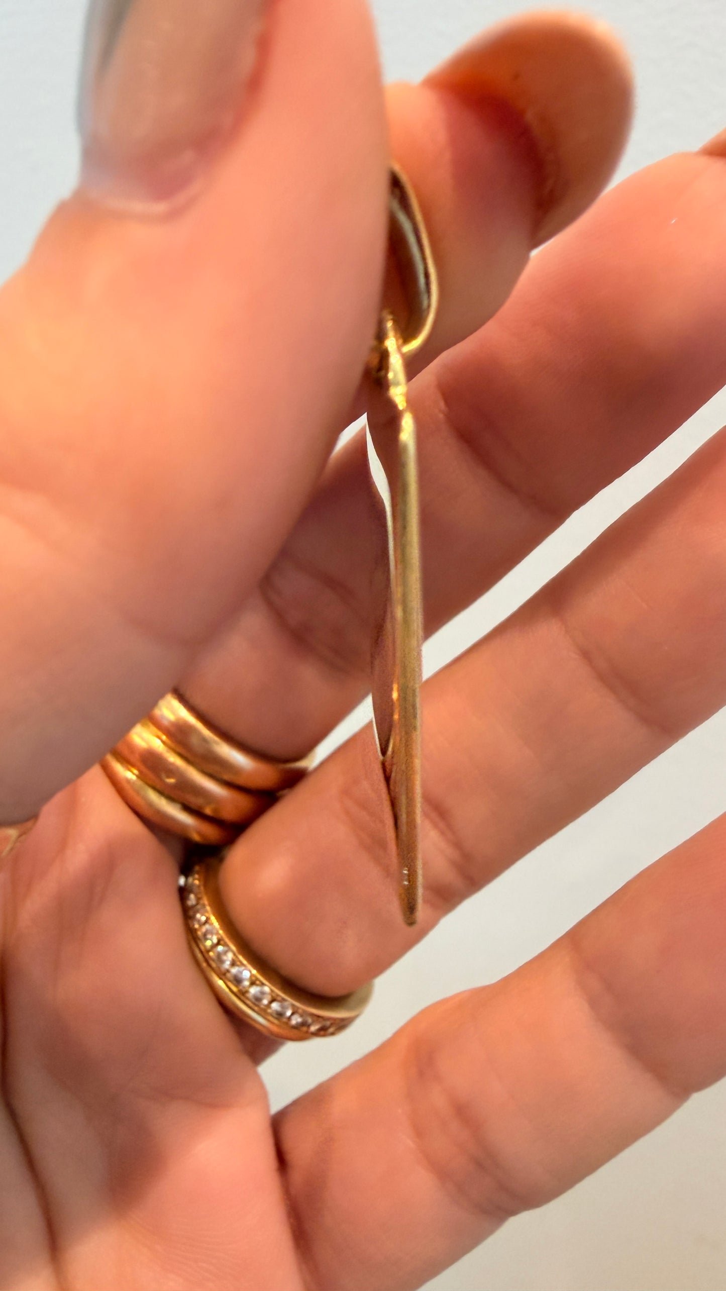 Vintage yellow 18K approx .12ctw diamond Bvlgari trefoil tag pendant