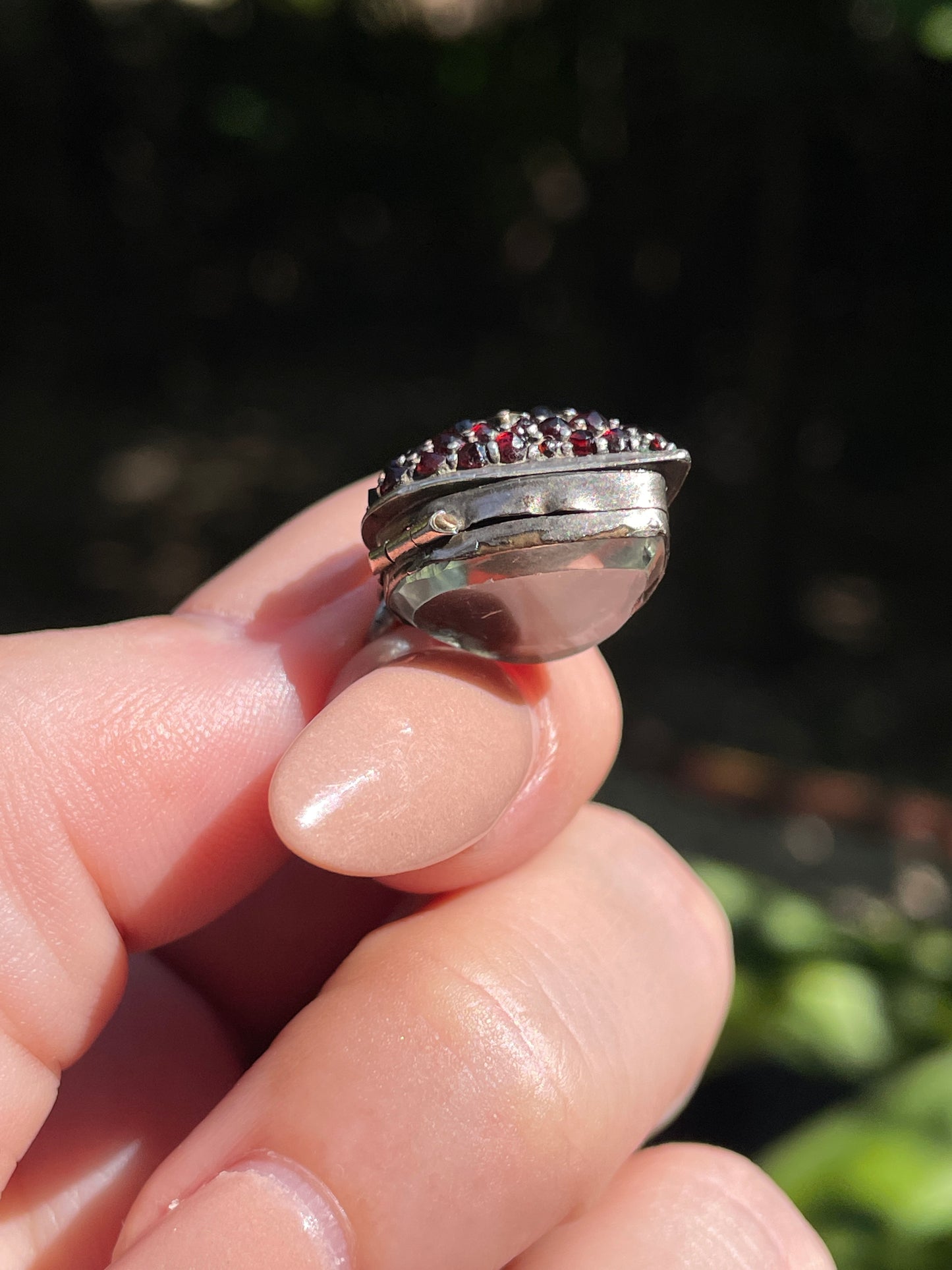 Antique sterling garnet heart celestial glass back locket charm
