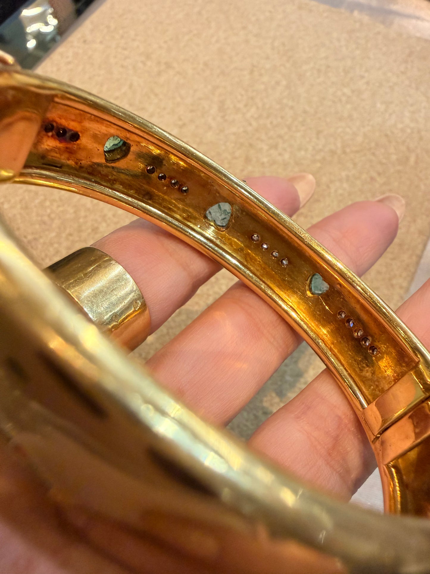 Vintage yellow 18K triple 1.73 ctw emerald and 1.14 ctw diamond heart bangle