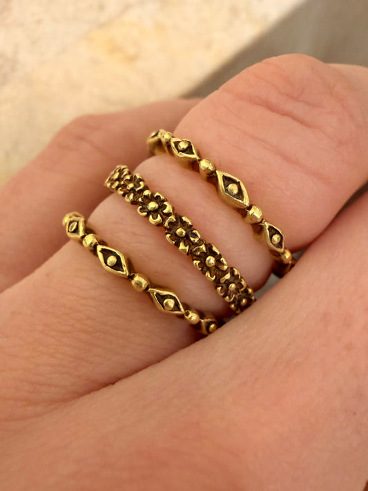 Vintage yellow 18K patterned eternity bands
