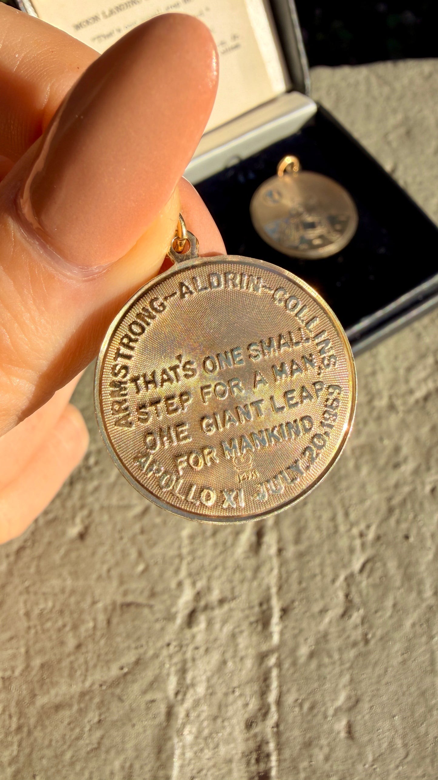 Vintage yellow 14K commemorative Moon Landing pendants with box from 1969