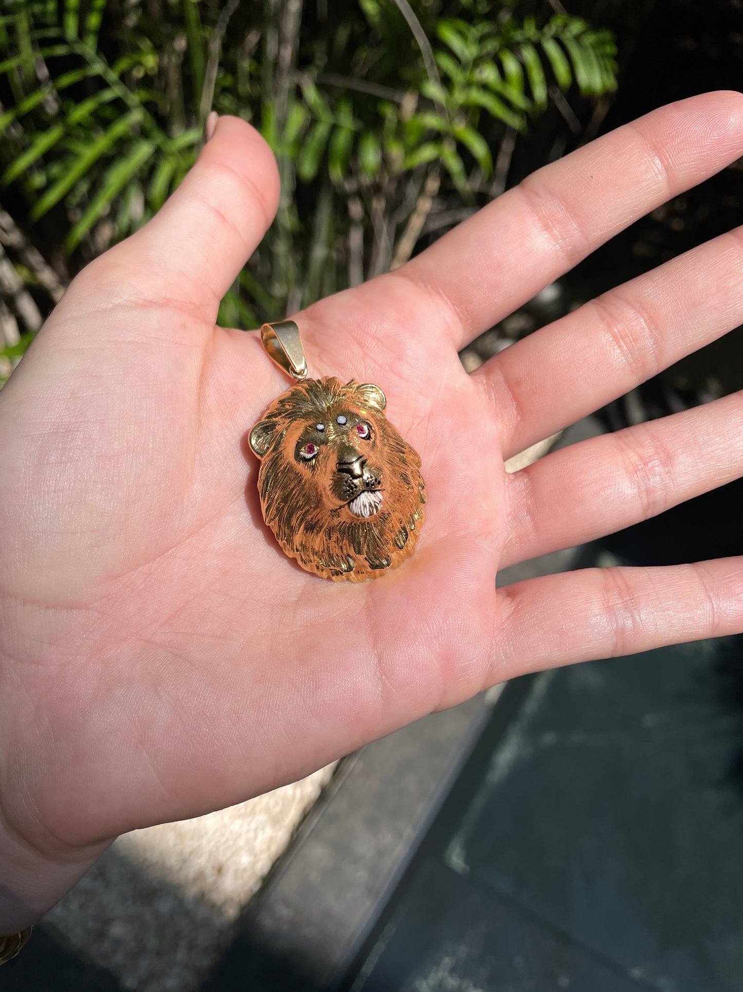 Vintage yellow 18K Lion statement pendant with enamel and ruby eyes