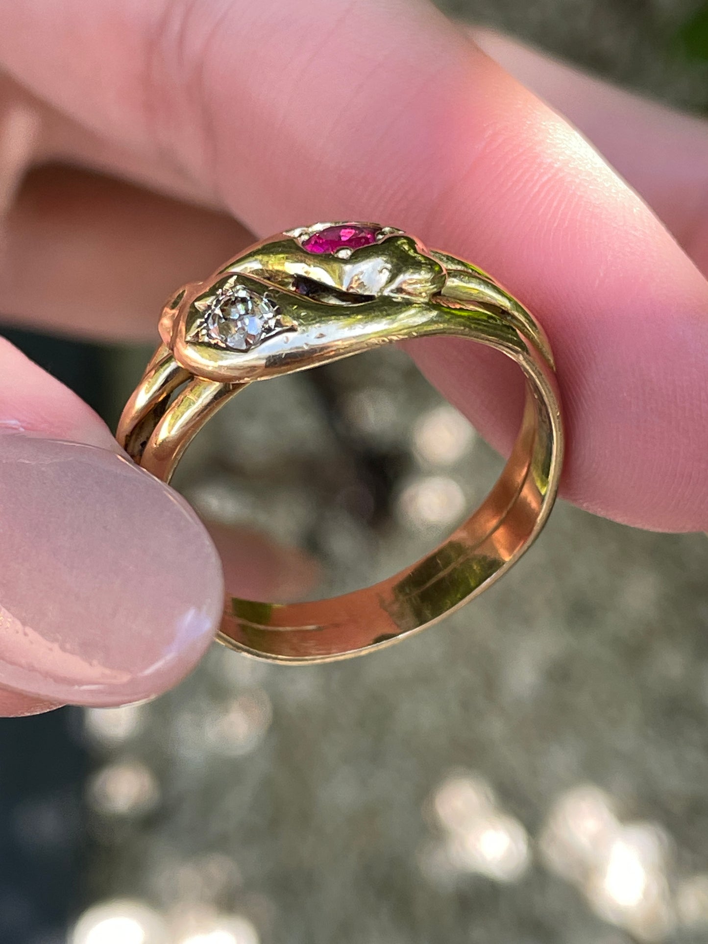 Antique Victorian yellow 18K pair of snakes ring with .25 ctw old mine cut diamond and .35 ctw ruby, size 11