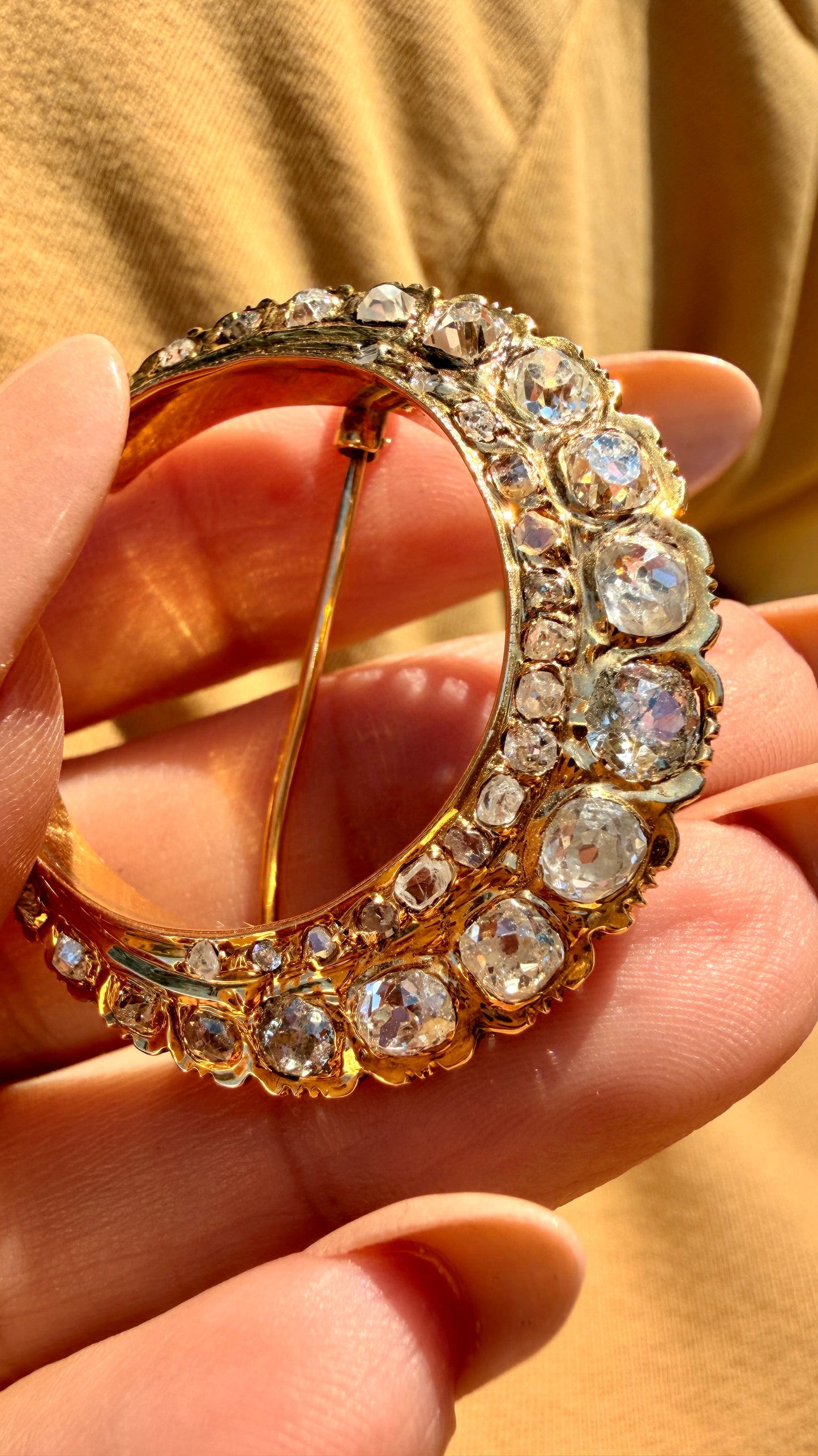 Antique yellow 18K crescent brooch with 2.6ctw of diamonds