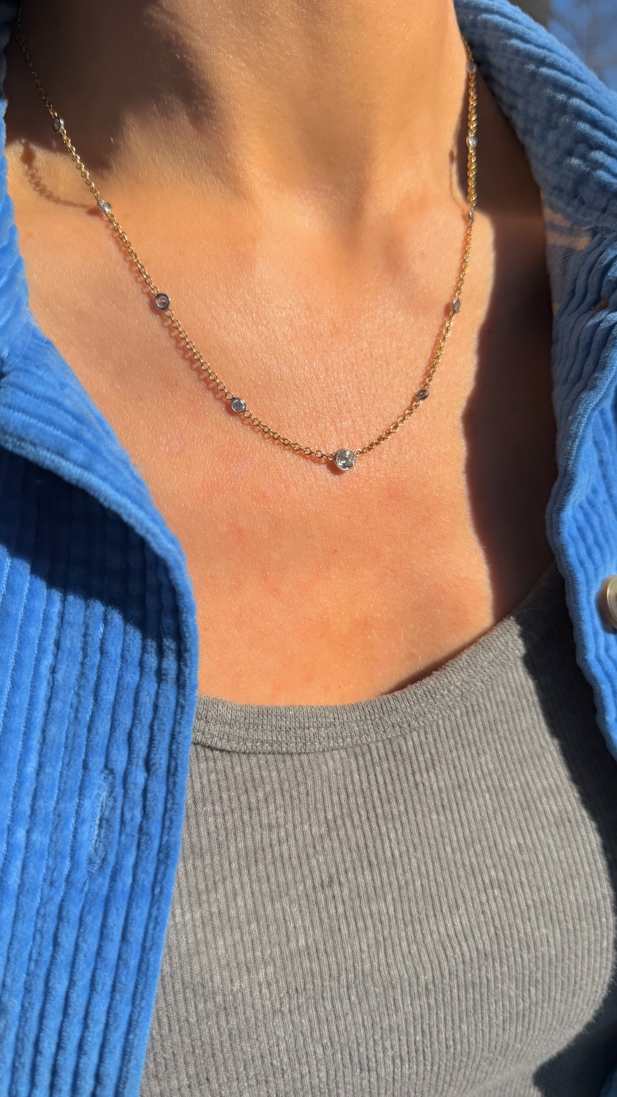 Vintage 18K approx 1.2ctw Old European Cut diamond and round diamond station chain, 18 3/8 inch