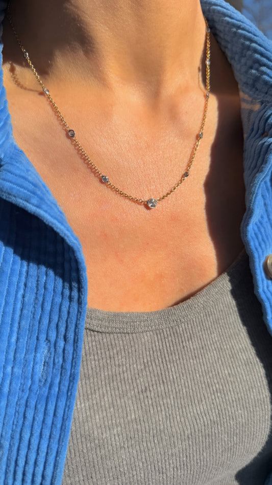 Vintage 18K approx 1.2ctw Old European Cut diamond and round diamond station chain, 18 3/8 inch