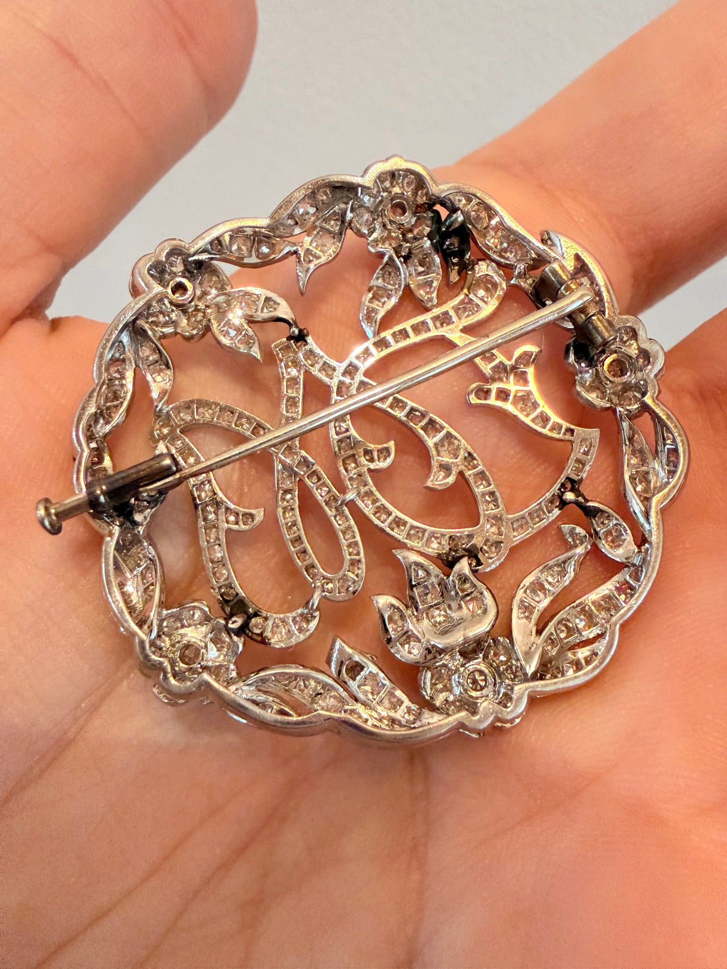 Vintage 1920s-30s Platinum Art Deco “DM” approx 2.26ctw diamond wreath brooch