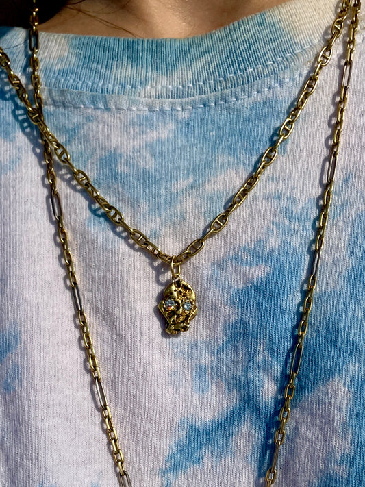 Vintage yellow 18K to 24K gold nugget skull with .12 ctw diamonds charm