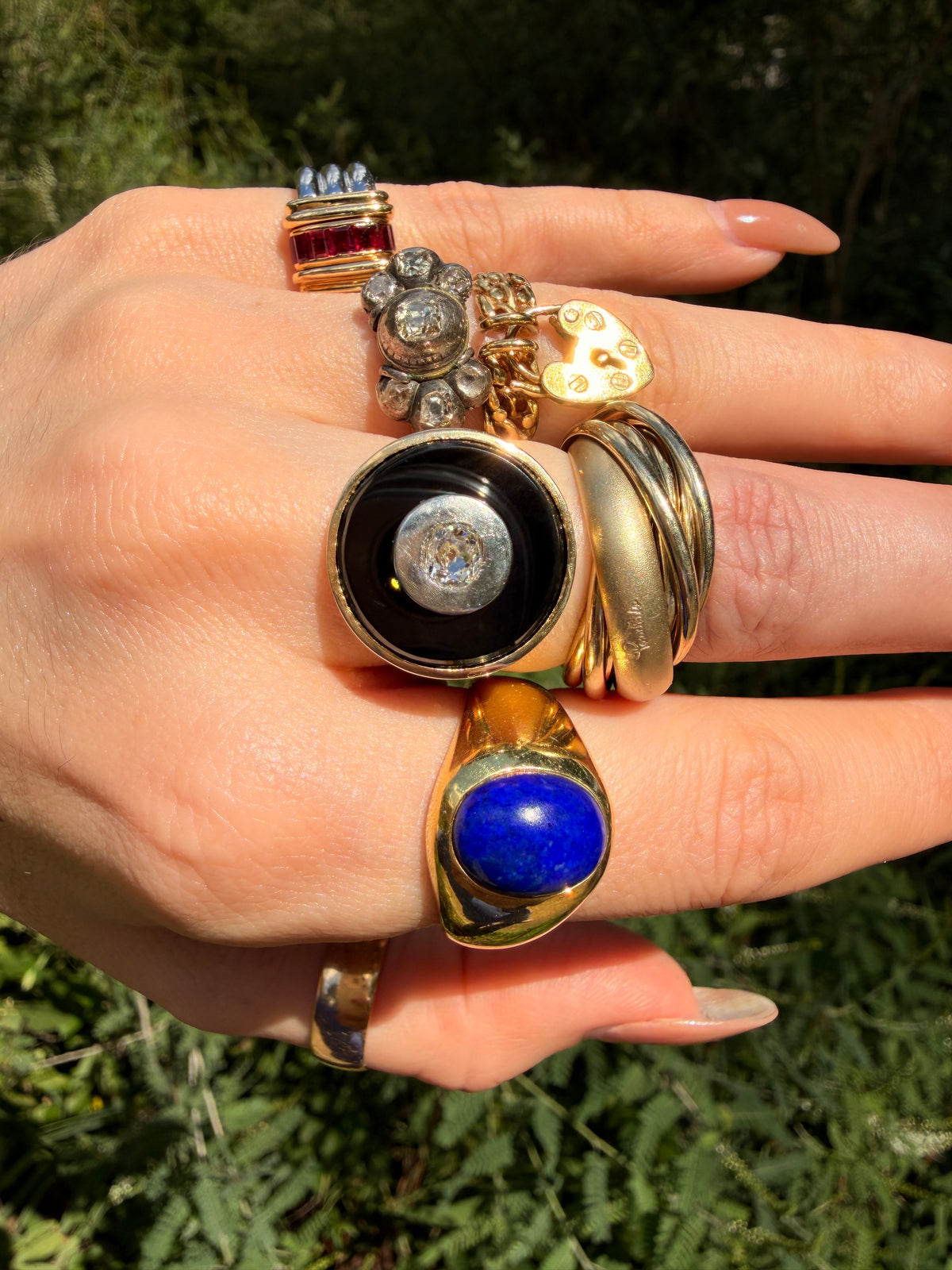 Vintage 18K onyx target ring with .5 ctw old mine cut diamond, size 7.25-7.5